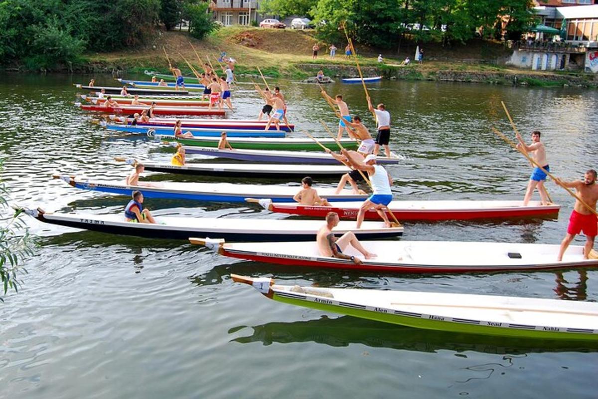 a group of people on boats in the water