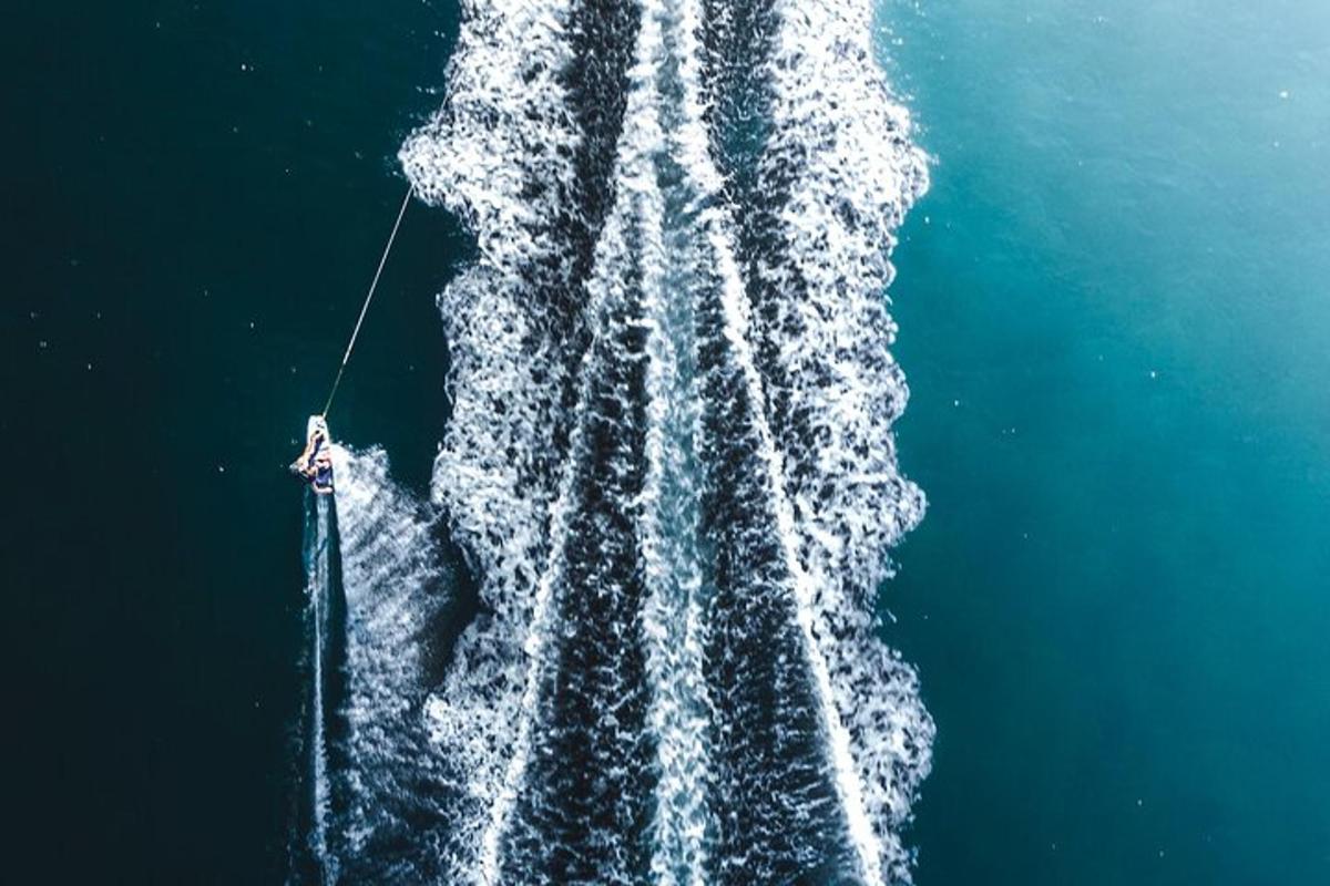 an aerial view of a boat in the water