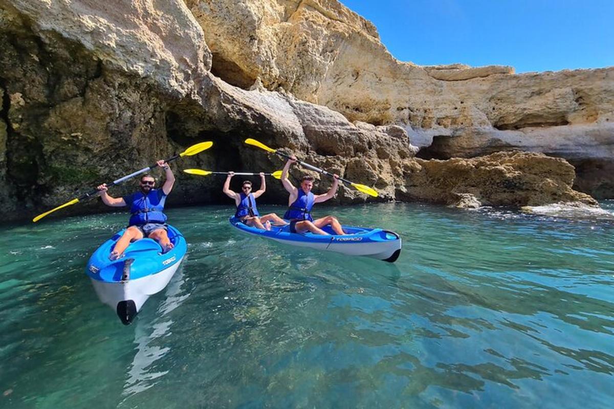 a group of people in kayaks in the water
