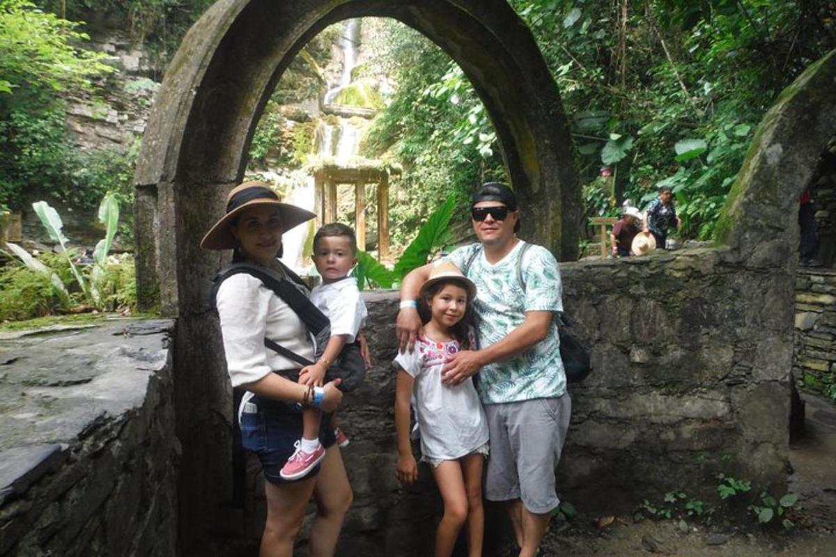 a group of people standing under an archway