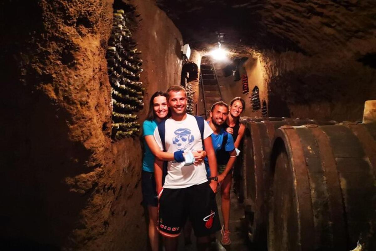 a group of people standing in a tunnel