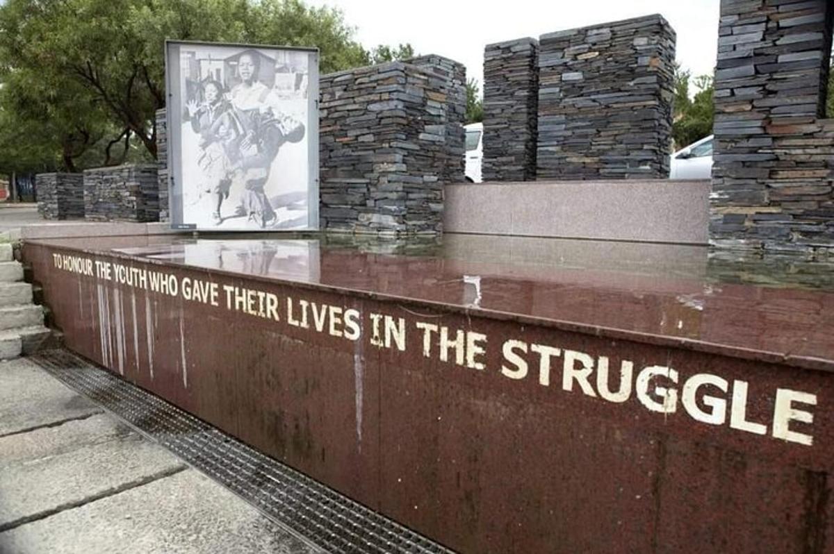 a sign that reads imagine someone living their lives in the struggle