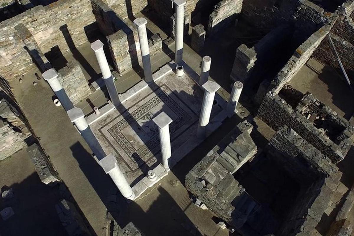 an overhead view of a building with white pipes