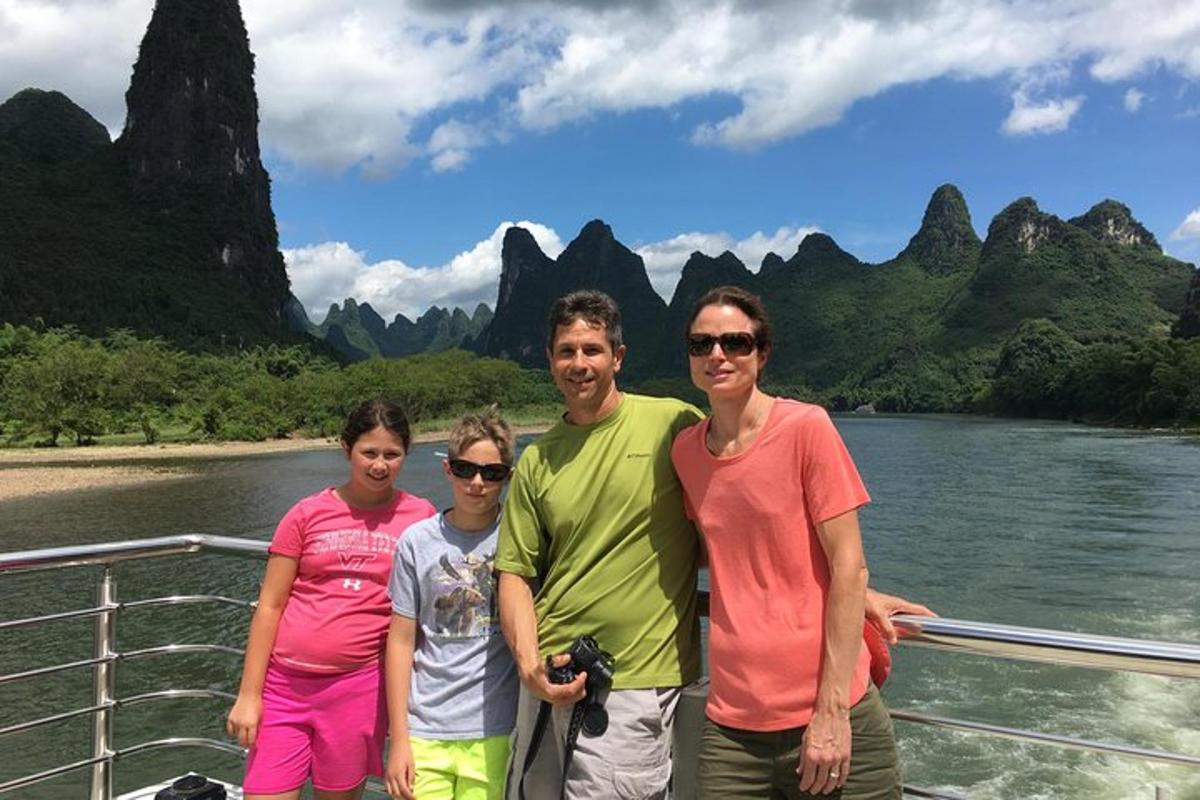 a group of people on a boat on a river