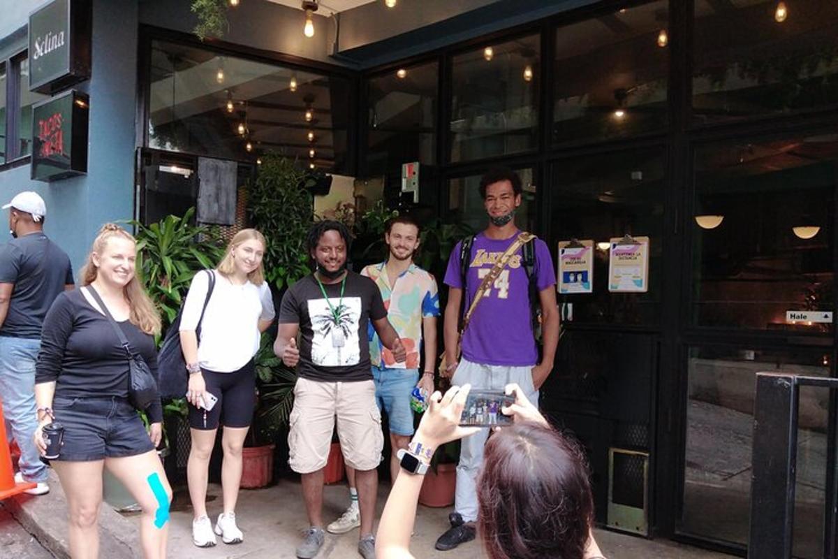 a group of people standing outside of a building