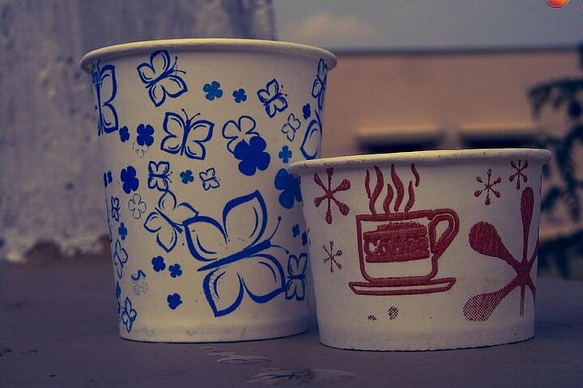 two cups sitting next to each other on a table