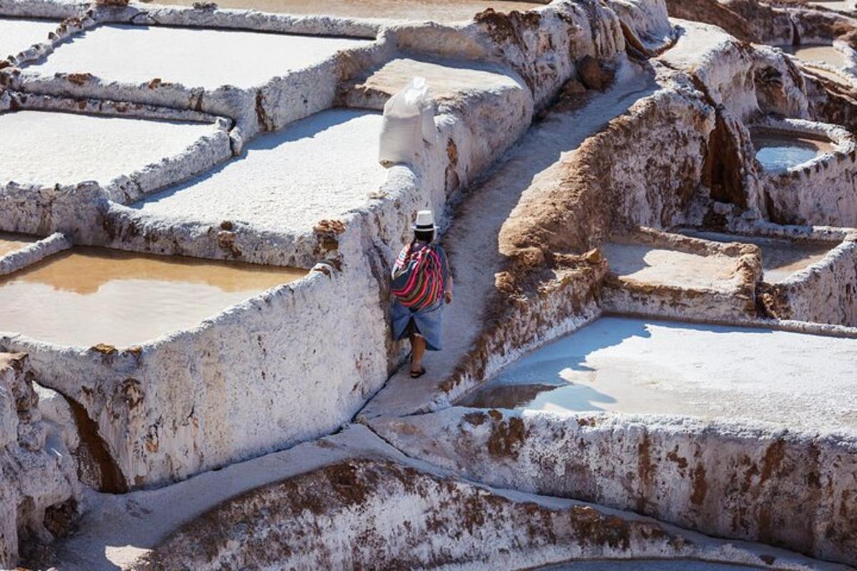 a man standing in the middle of concrete steps