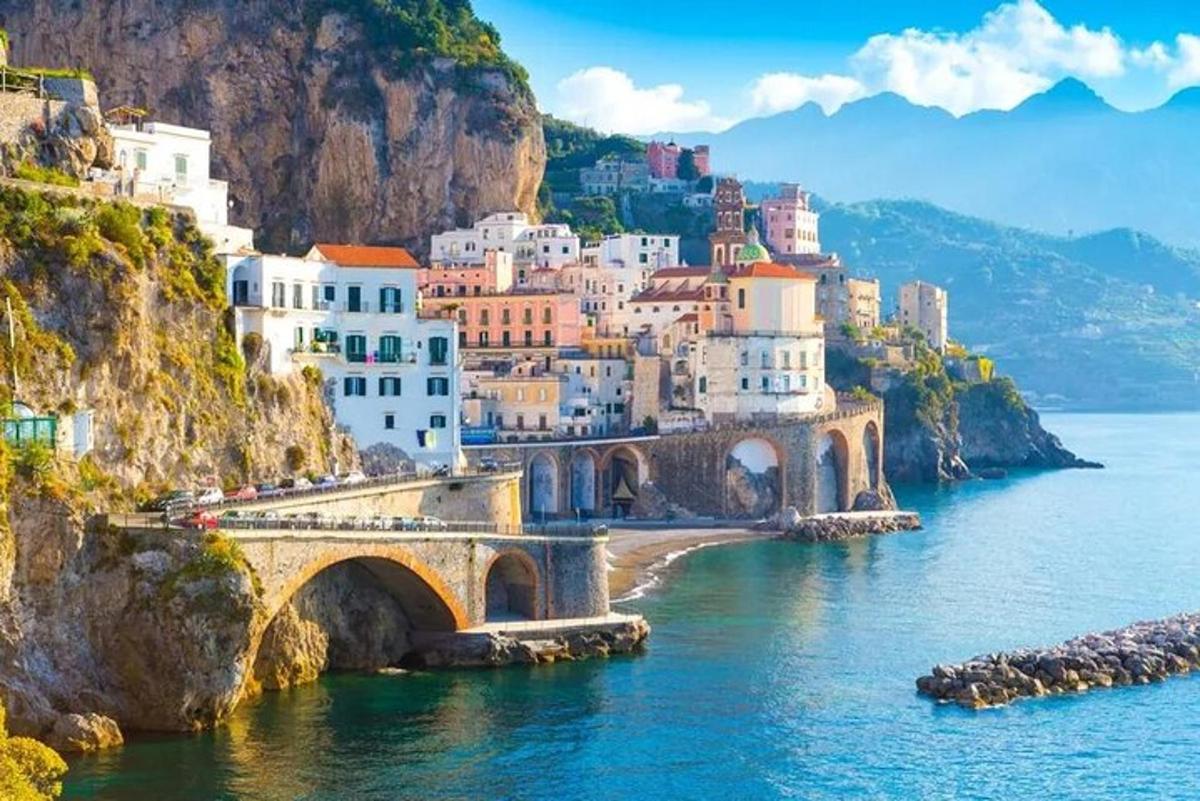a view of the amalfi coast with a bridge
