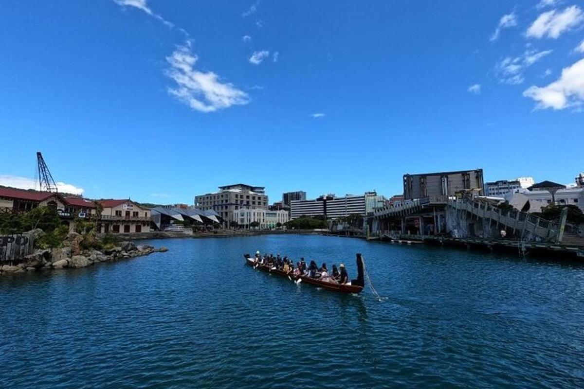 a group of people in a boat on a river