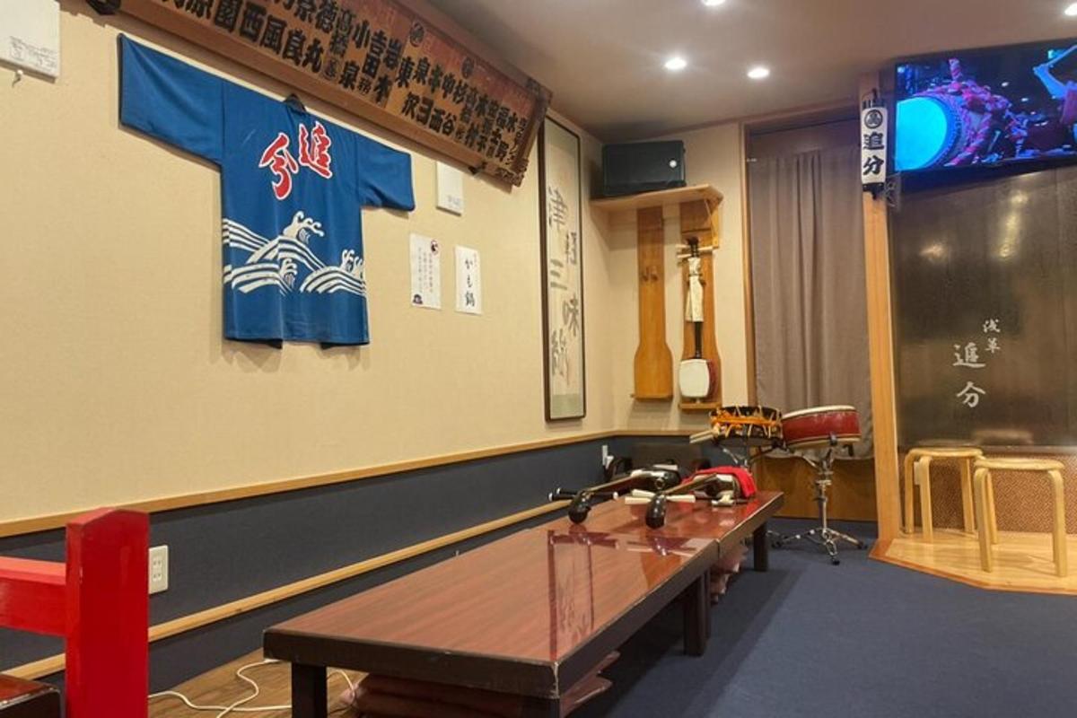 a room with a ping pong table in a classroom