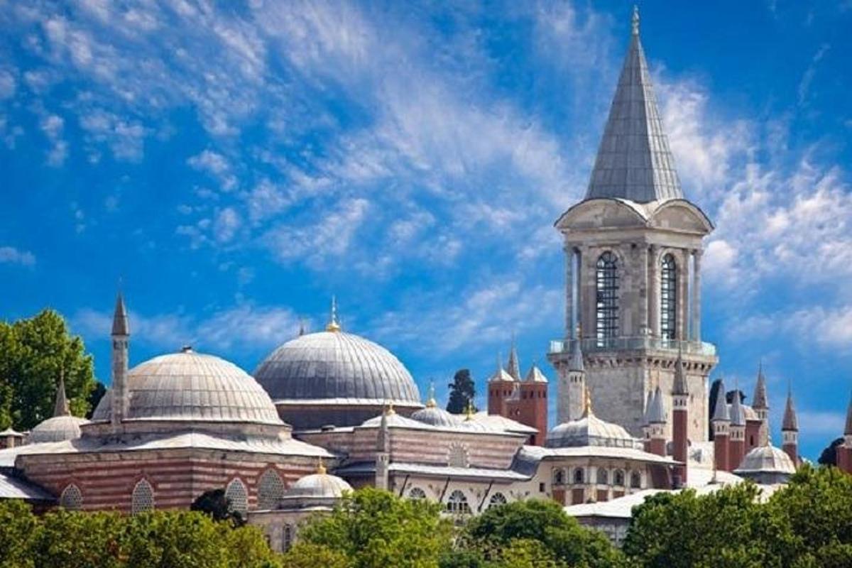 a group of buildings with domes and a tower
