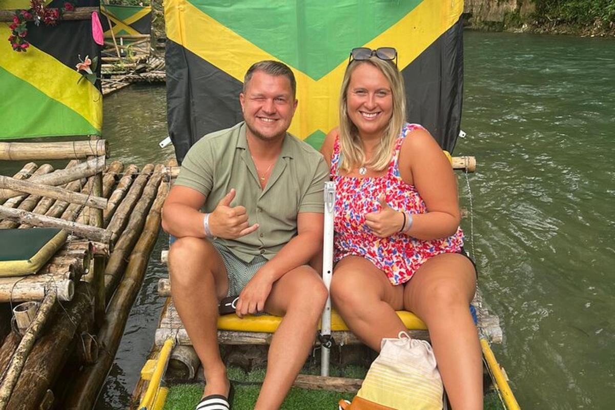 a man and a woman sitting on a boat