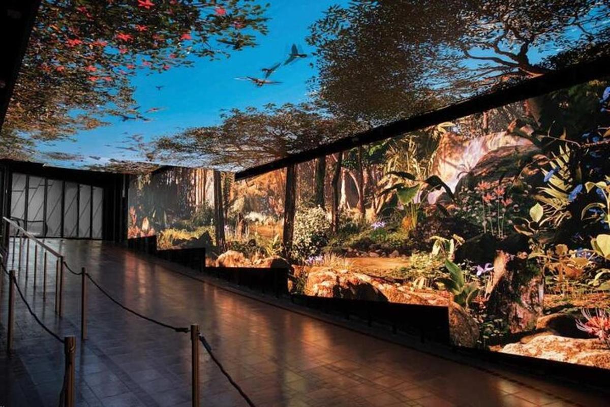 a large painting of a garden on a wall
