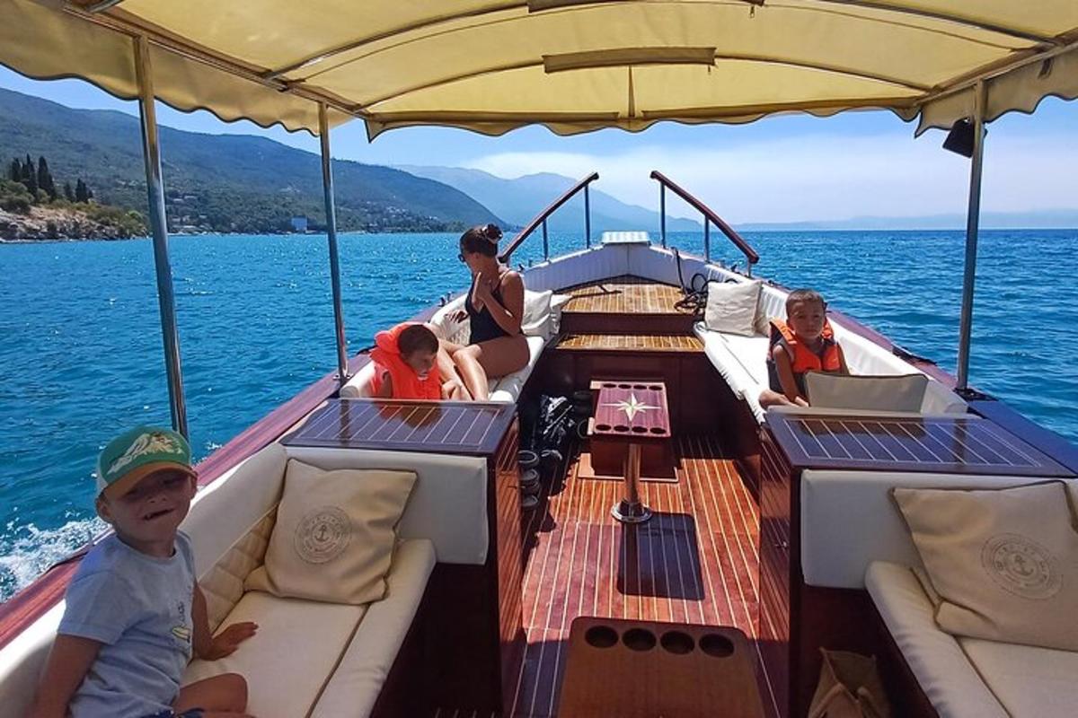 a group of people on a boat in the water