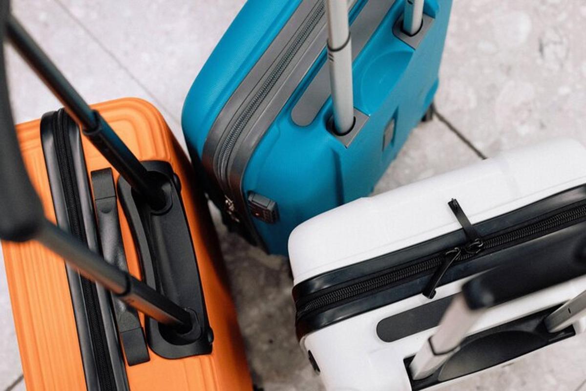 two pieces of luggage sitting next to each other