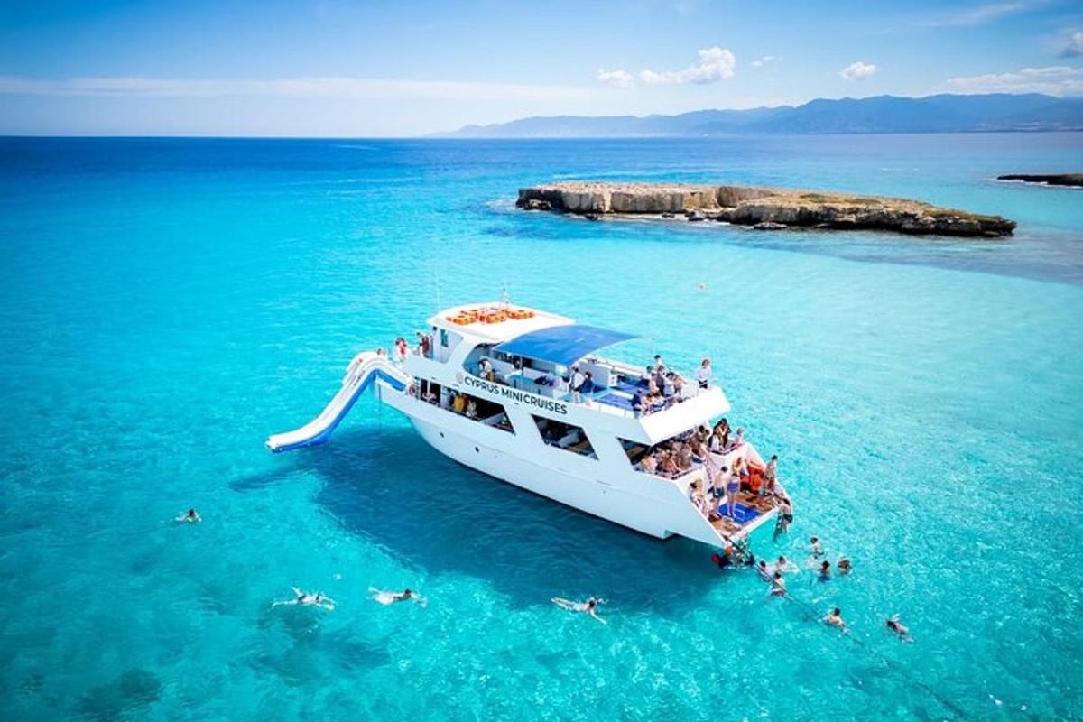 a group of people on a boat in the water