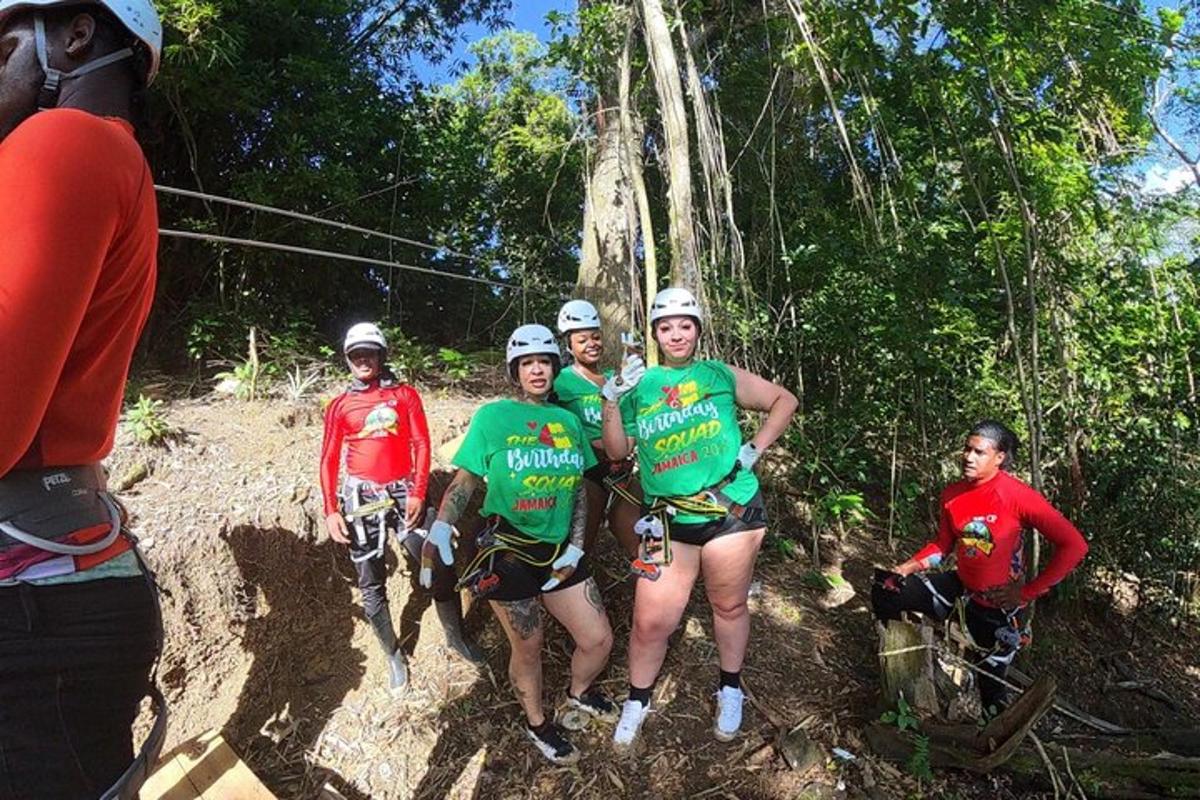 a group of people riding bikes on a dirt trail
