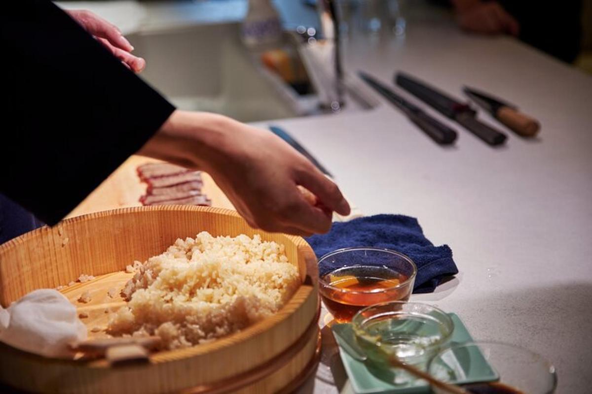 a person is preparing a dish of food on a counter