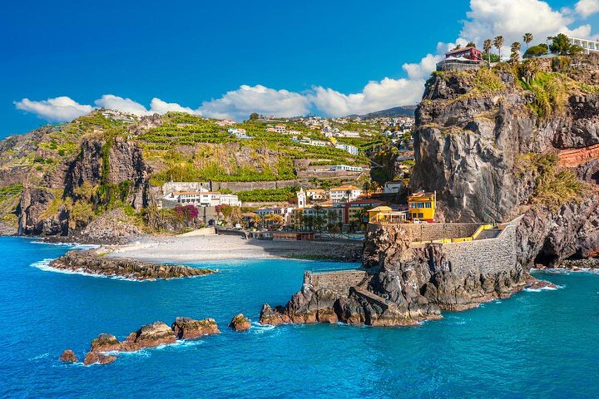 a view of a rocky island in the ocean