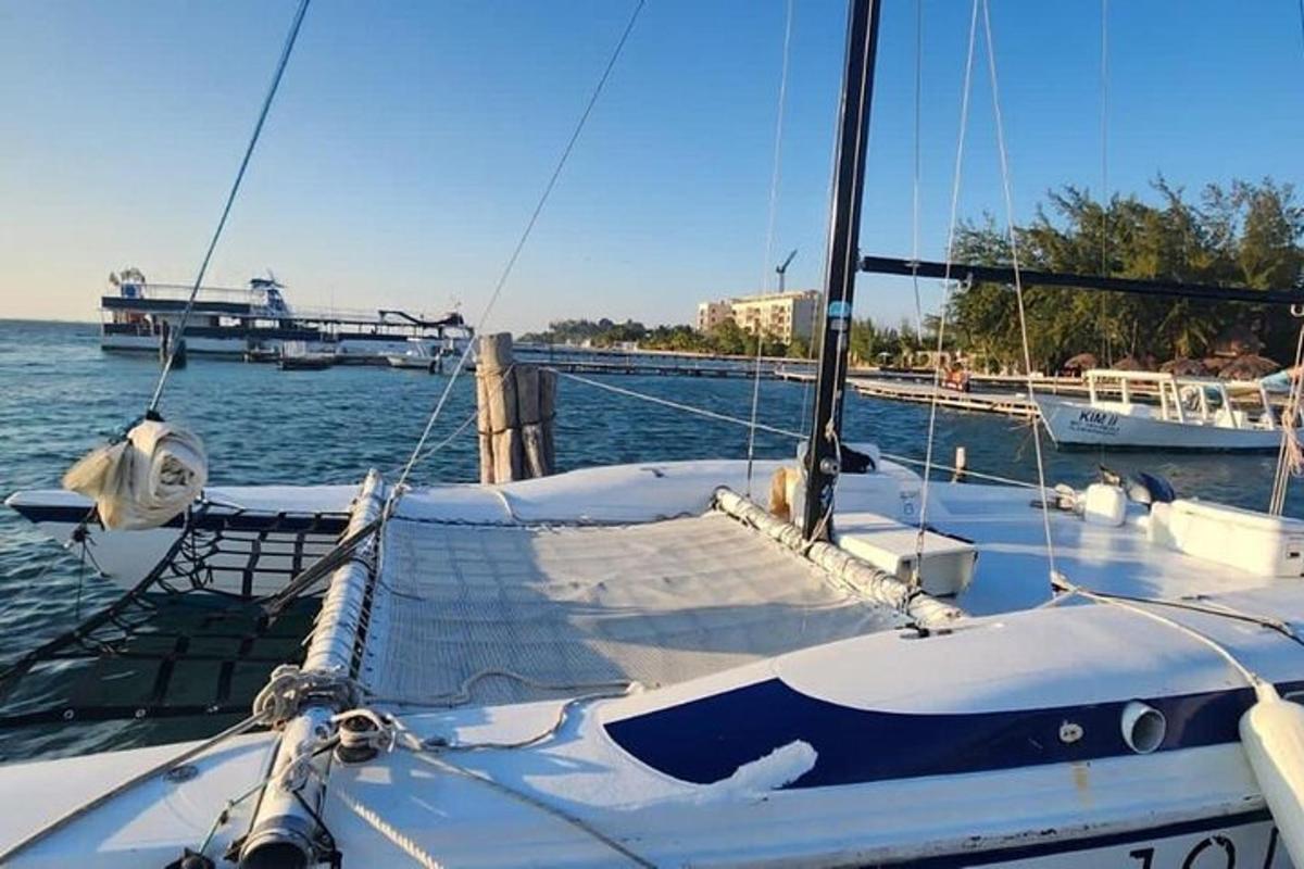 a boat is docked at a dock in the water