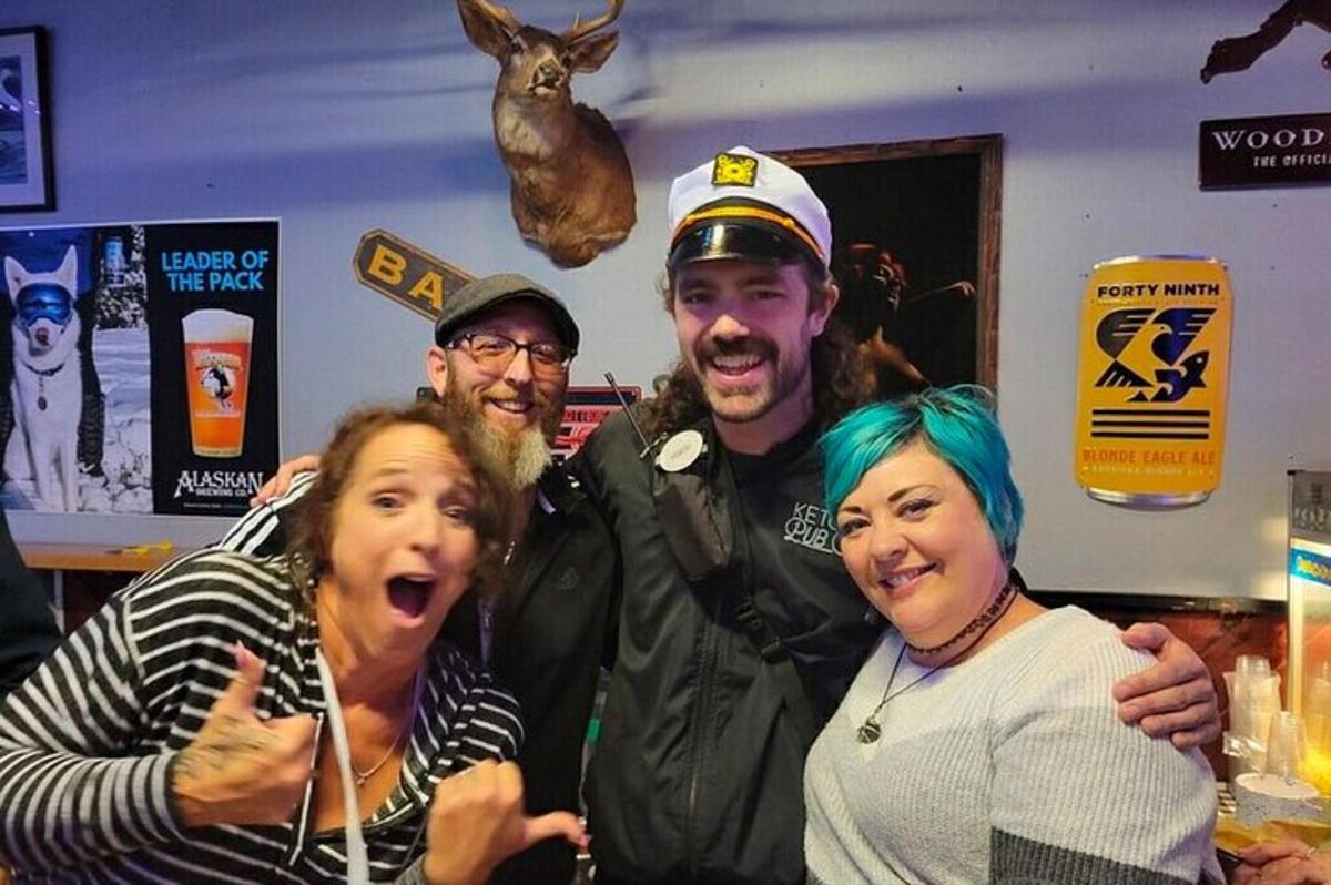 a group of three people posing for a picture