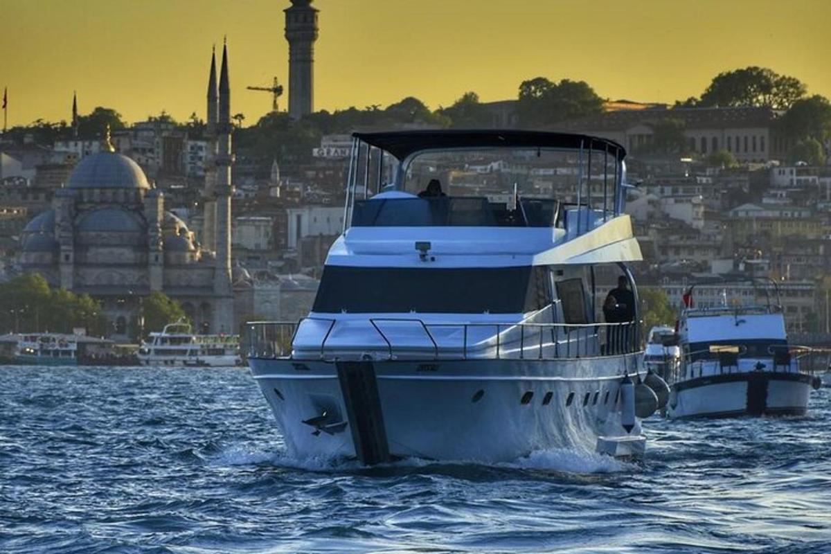 two boats in the water with a city in the background