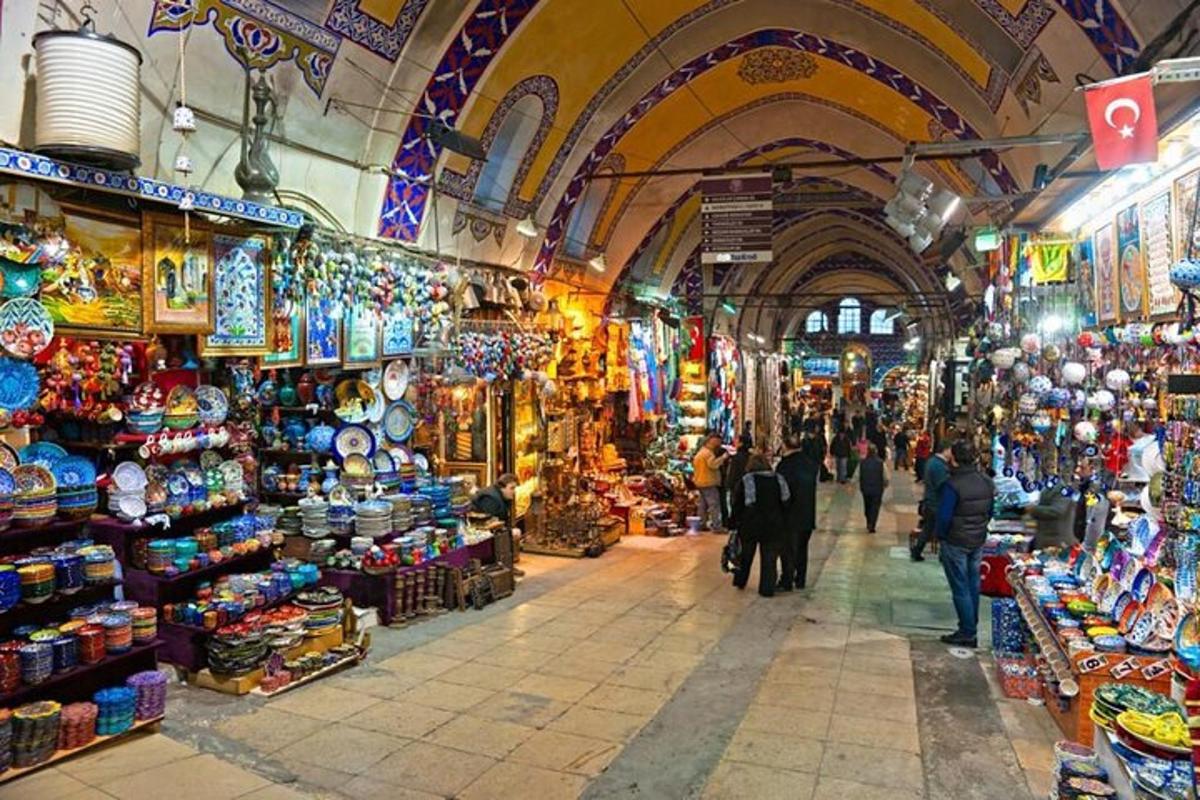 a market with people walking around in a building