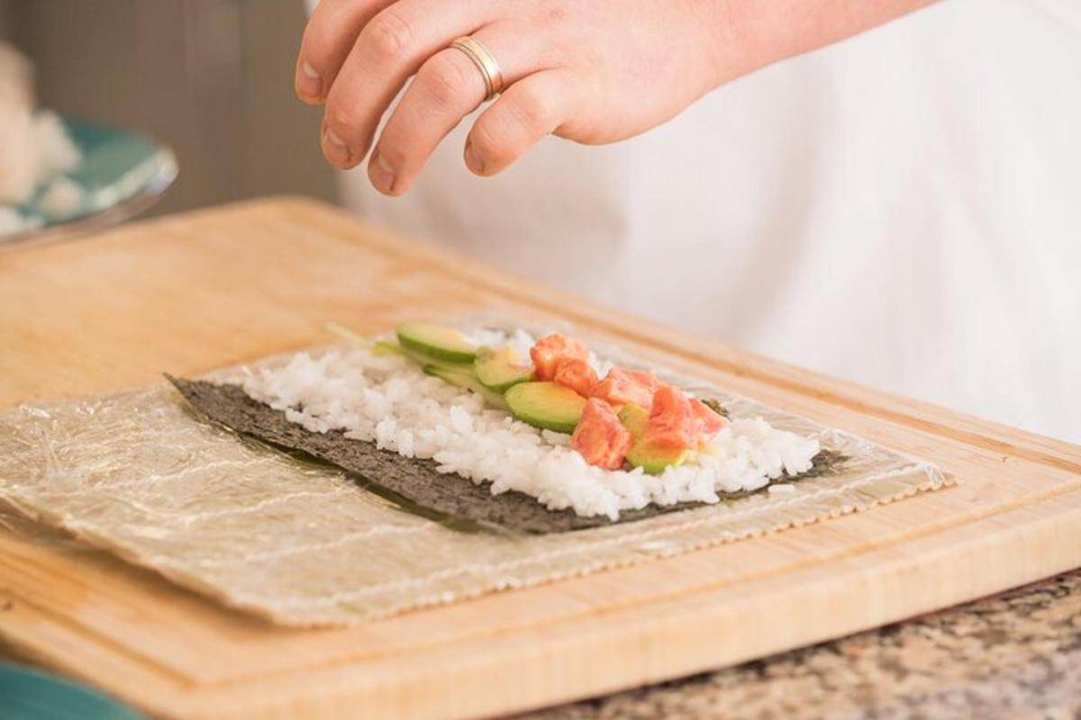 a person is preparing food on a cutting board