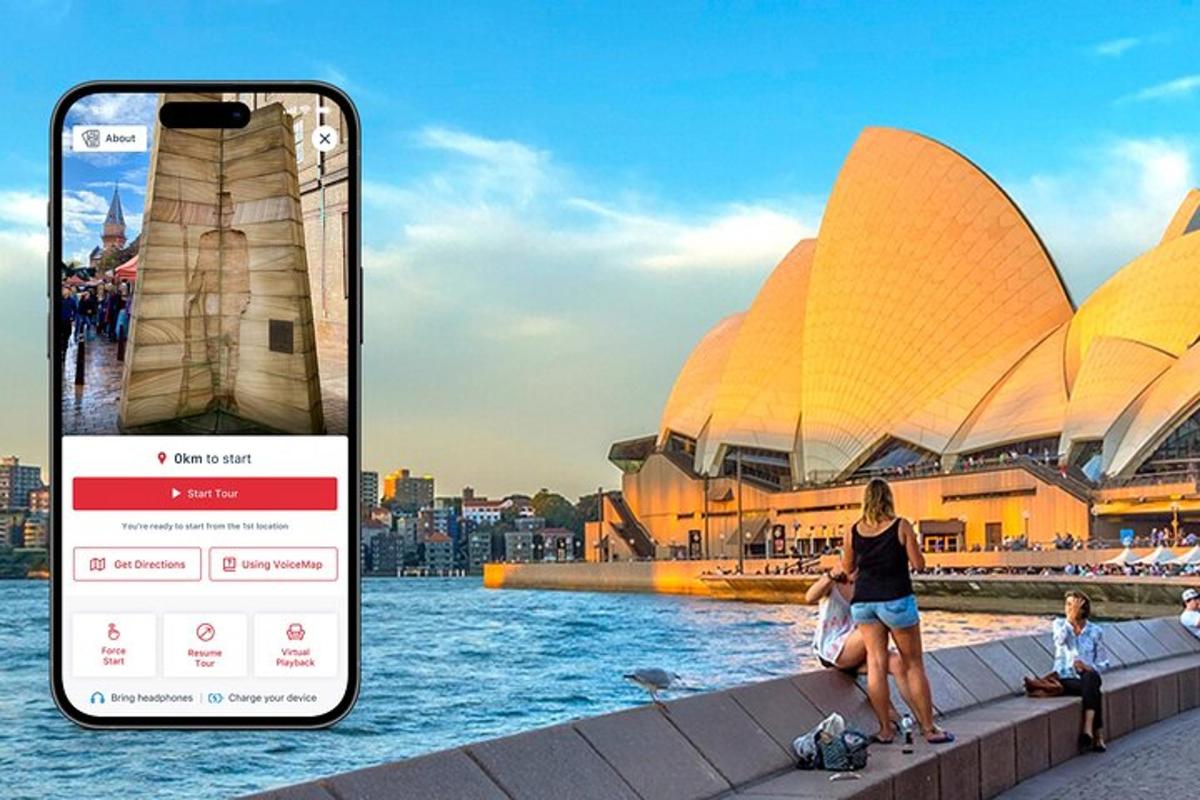 egy mobiltelefon, kilátással a Sydney-i Operaházra
