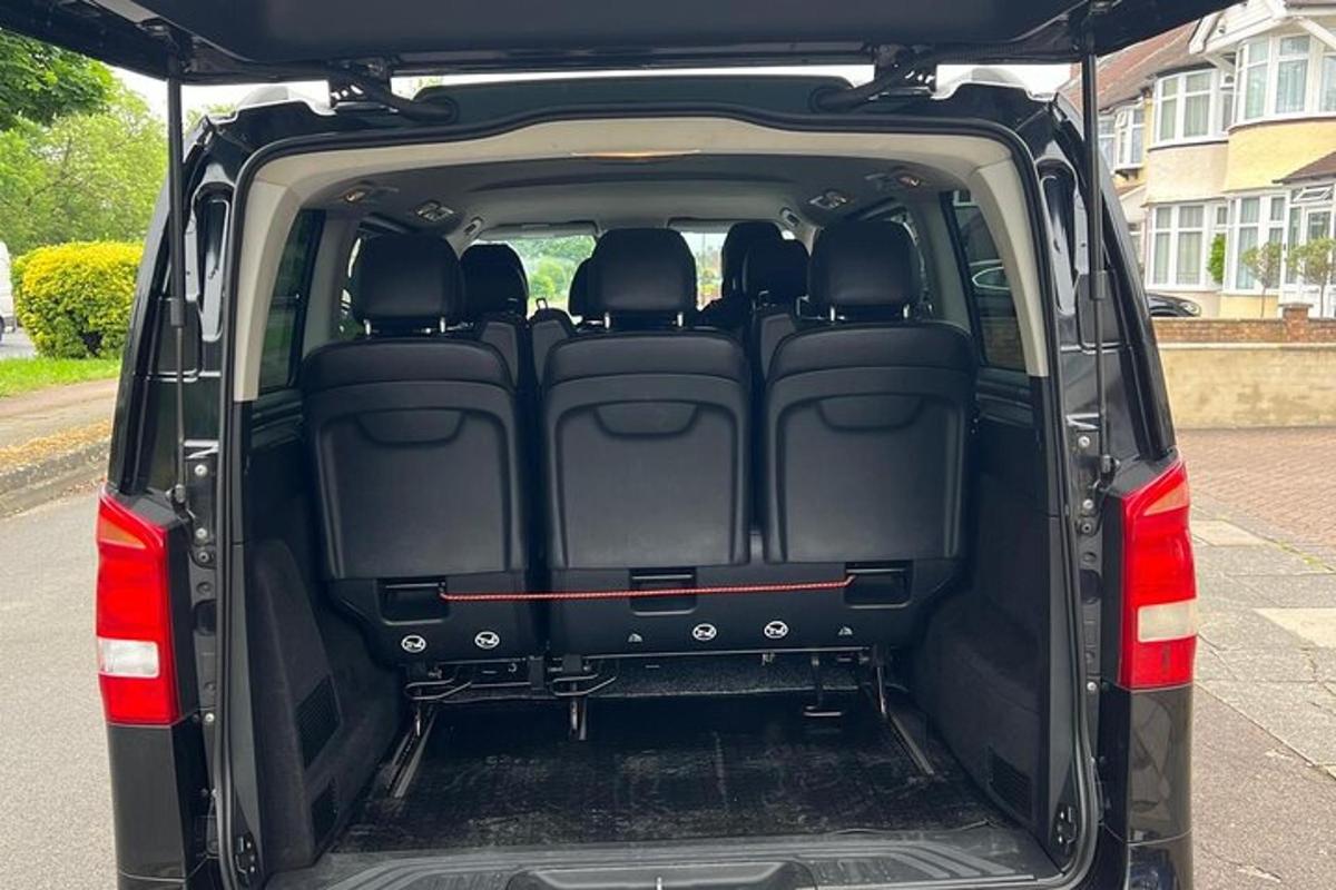 a back end of a van with the back doors open