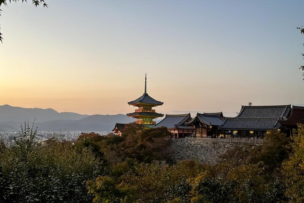 a building with a tower on top of a hill