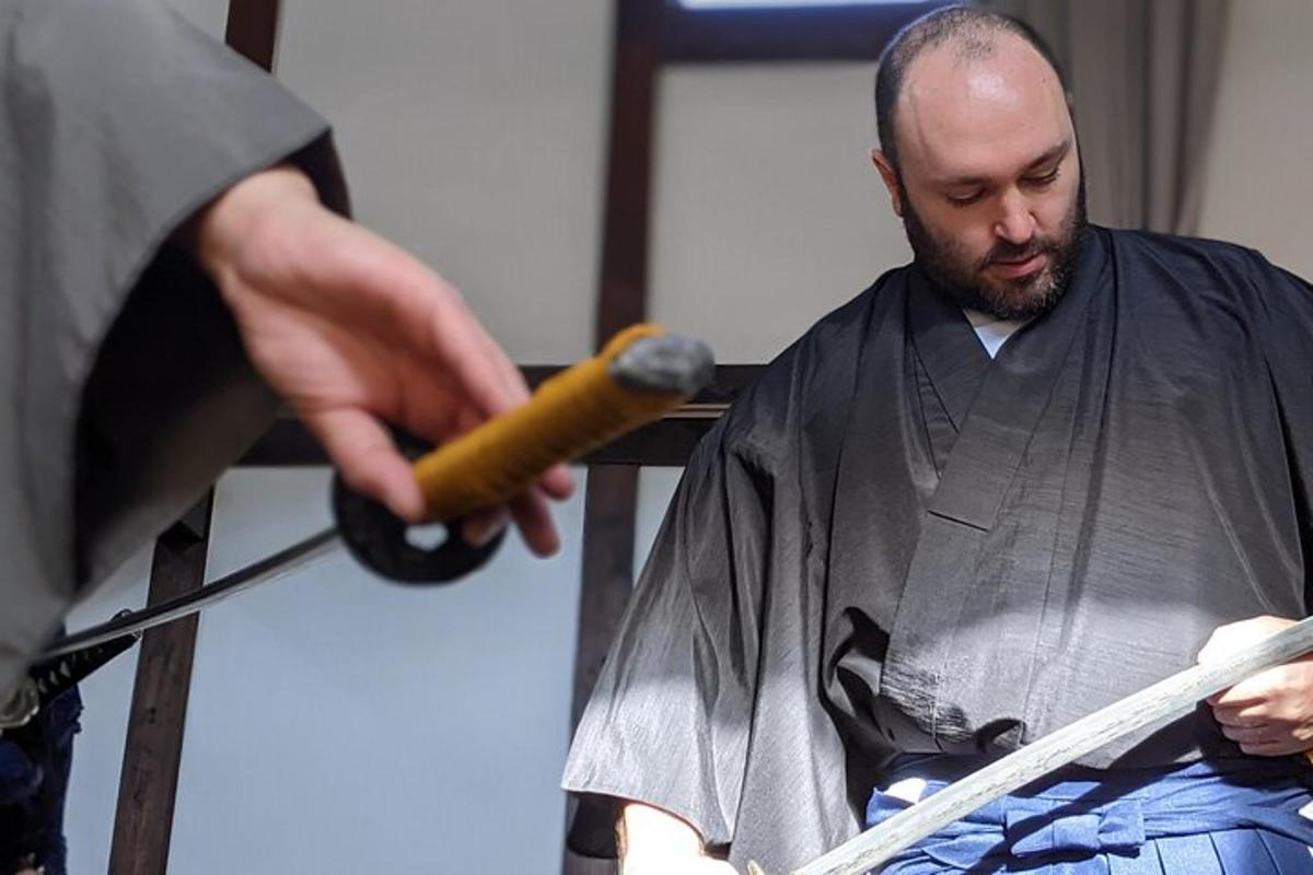 a man is holding a sword with a wand