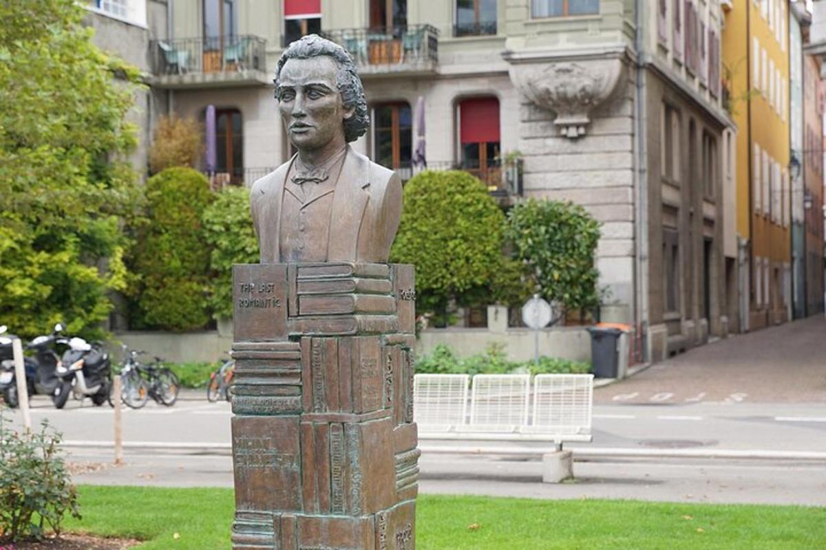 a statue of a bust of a man with books