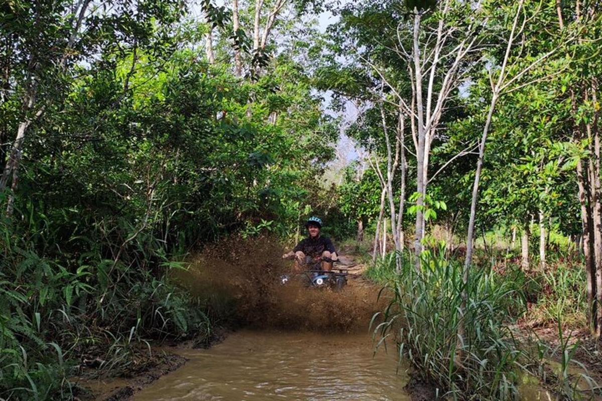 a person is riding a bike through a river