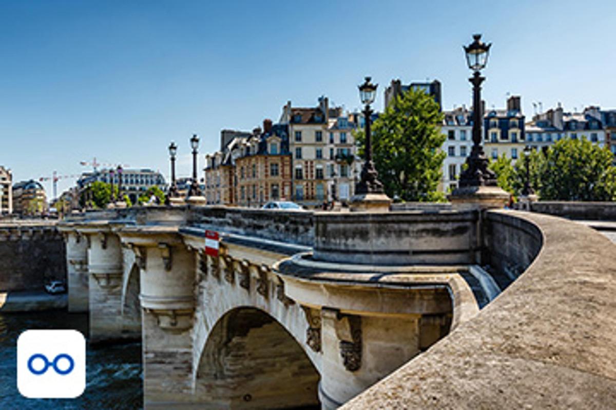 a bridge over a river in a city