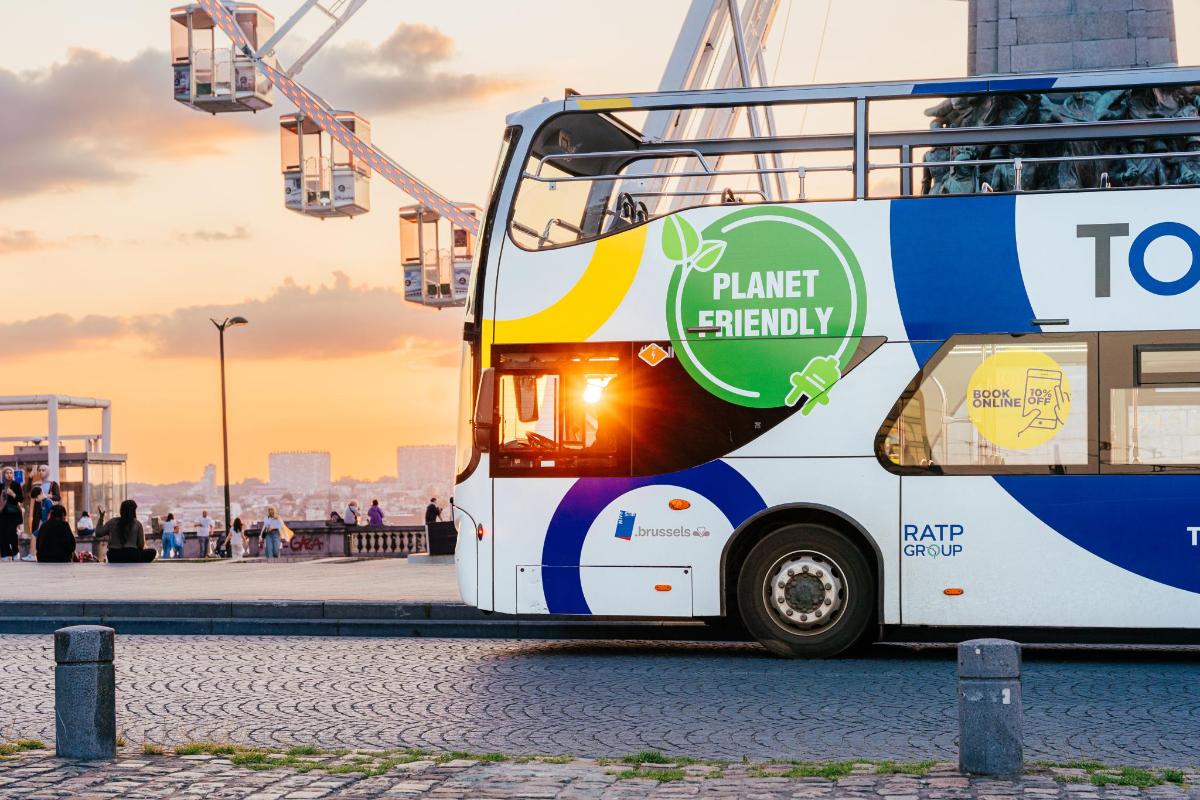 a double decker bus is parked on a street