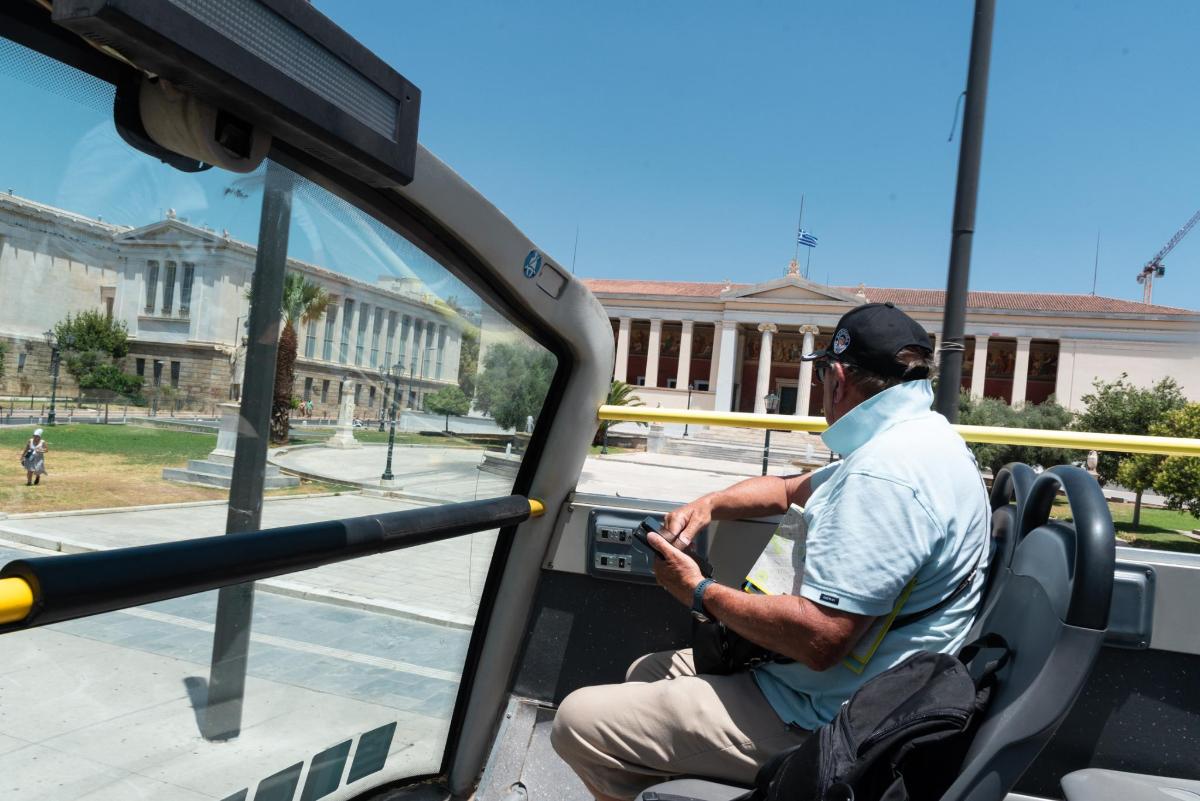 a man sitting in a bus