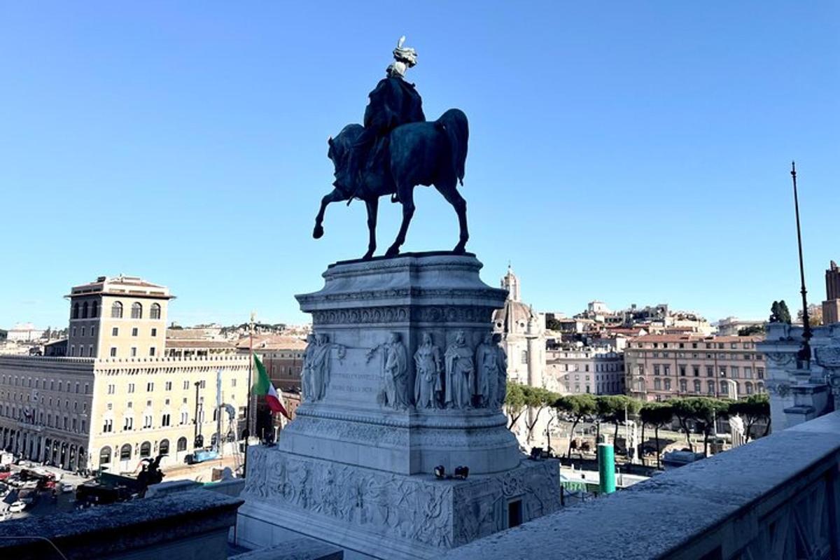 a statue of a man on a horse on a bridge