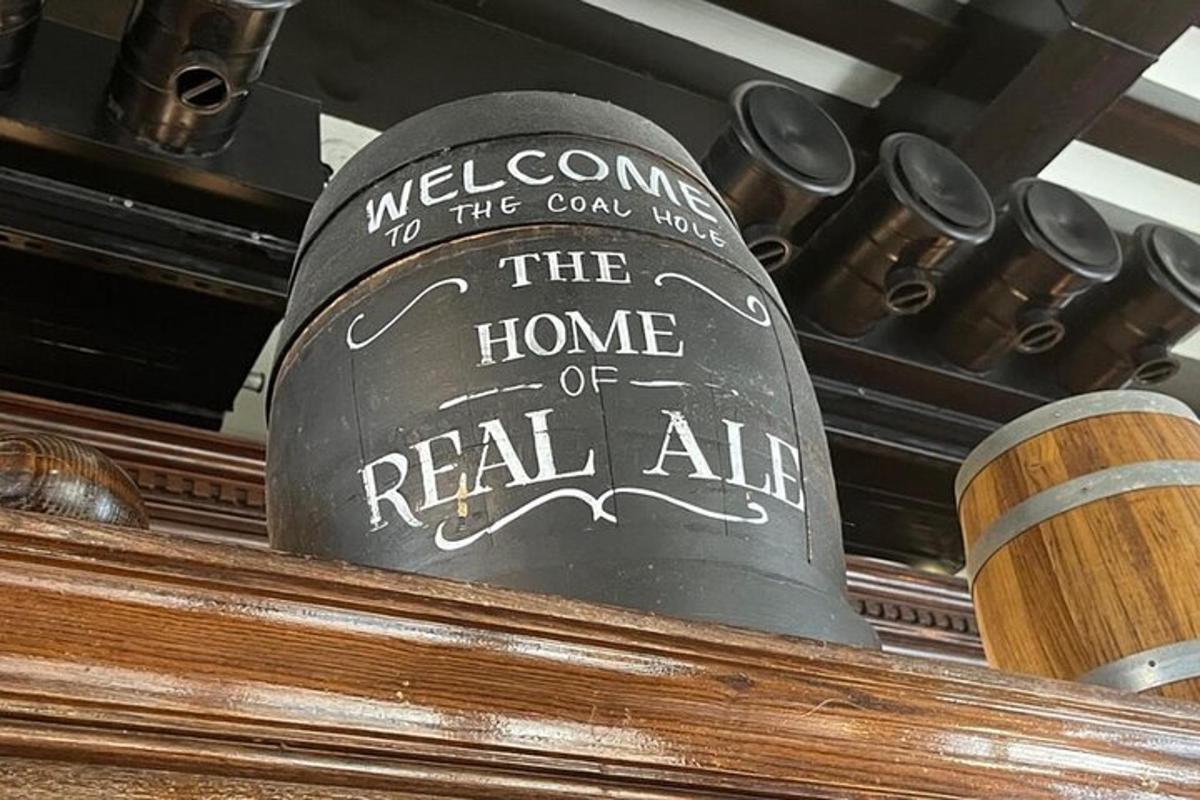 a bell that says the home of real ale