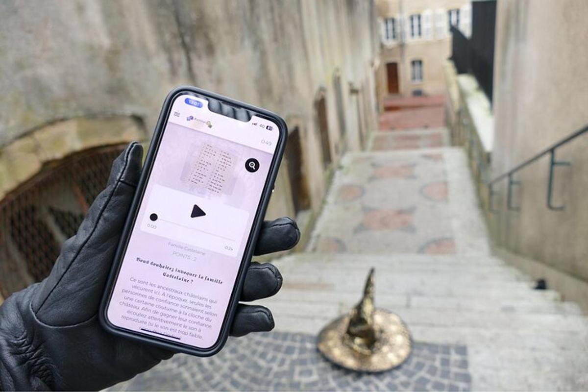 a person holding a cell phone in their hand
