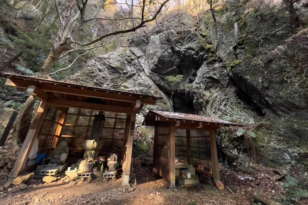 a small shrine in the middle of a mountain