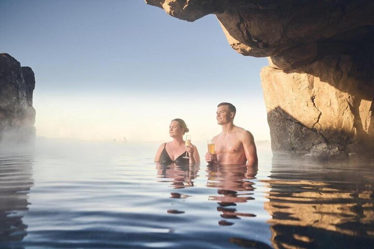 a man and a woman standing in the water