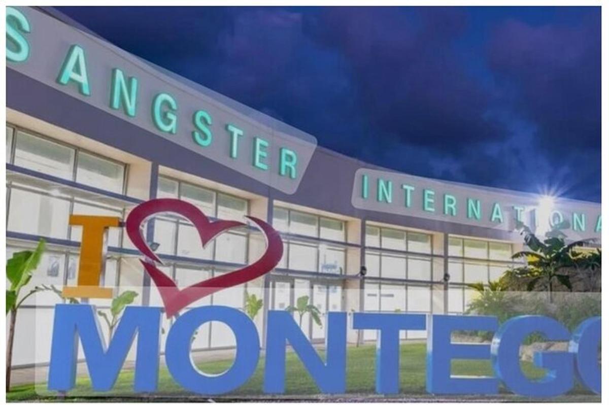 a hospital with a heart sign in front of it