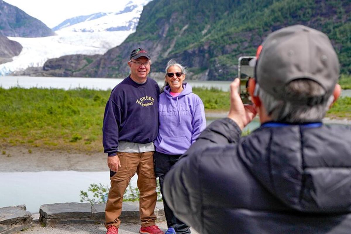 a man taking a picture of a woman with a camera