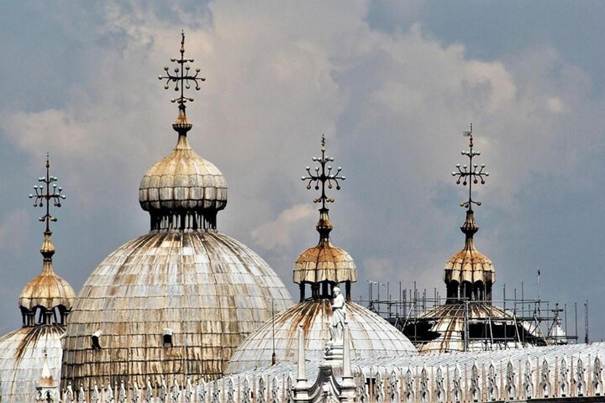 a building with domes with crosses on top of it