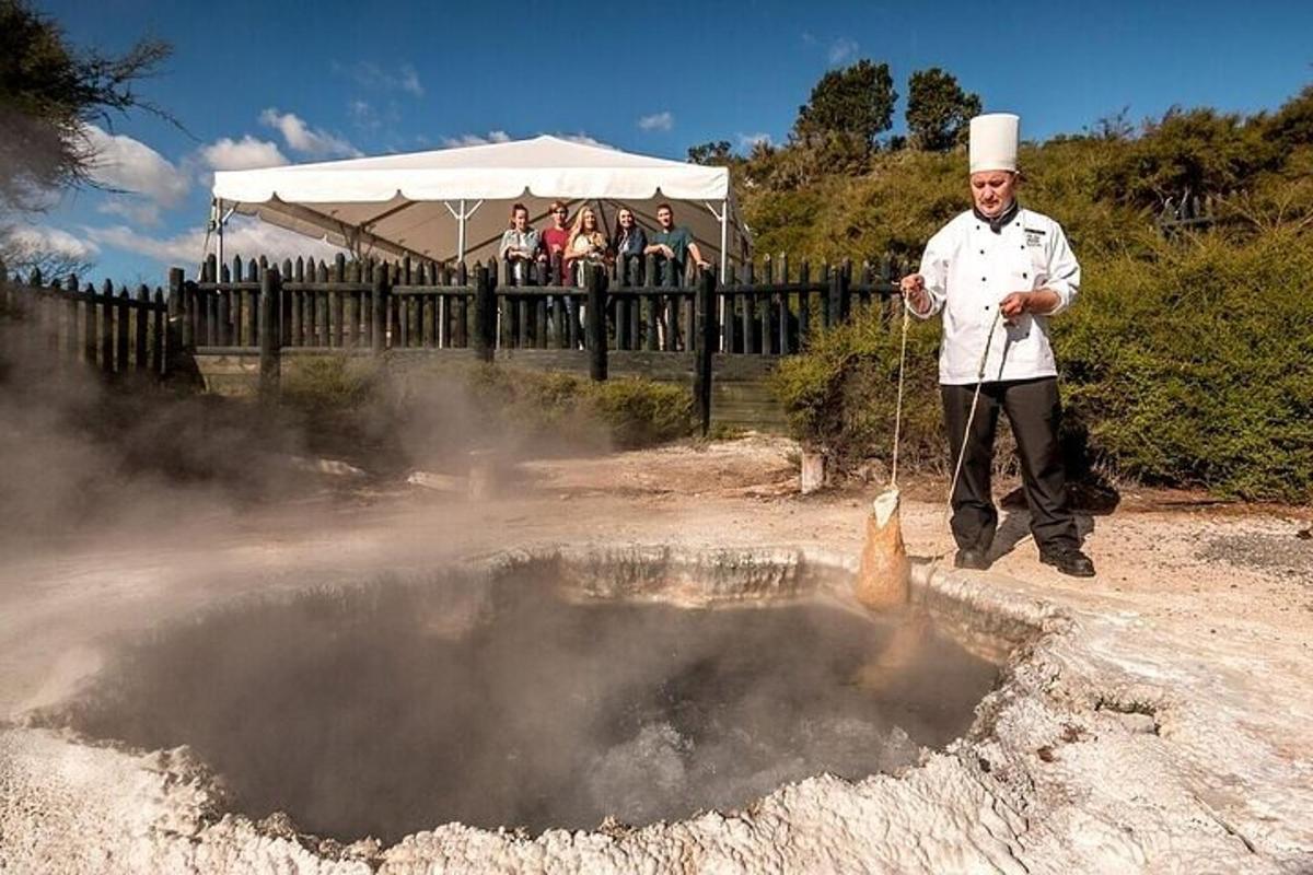 a chef standing in front of a hot spring