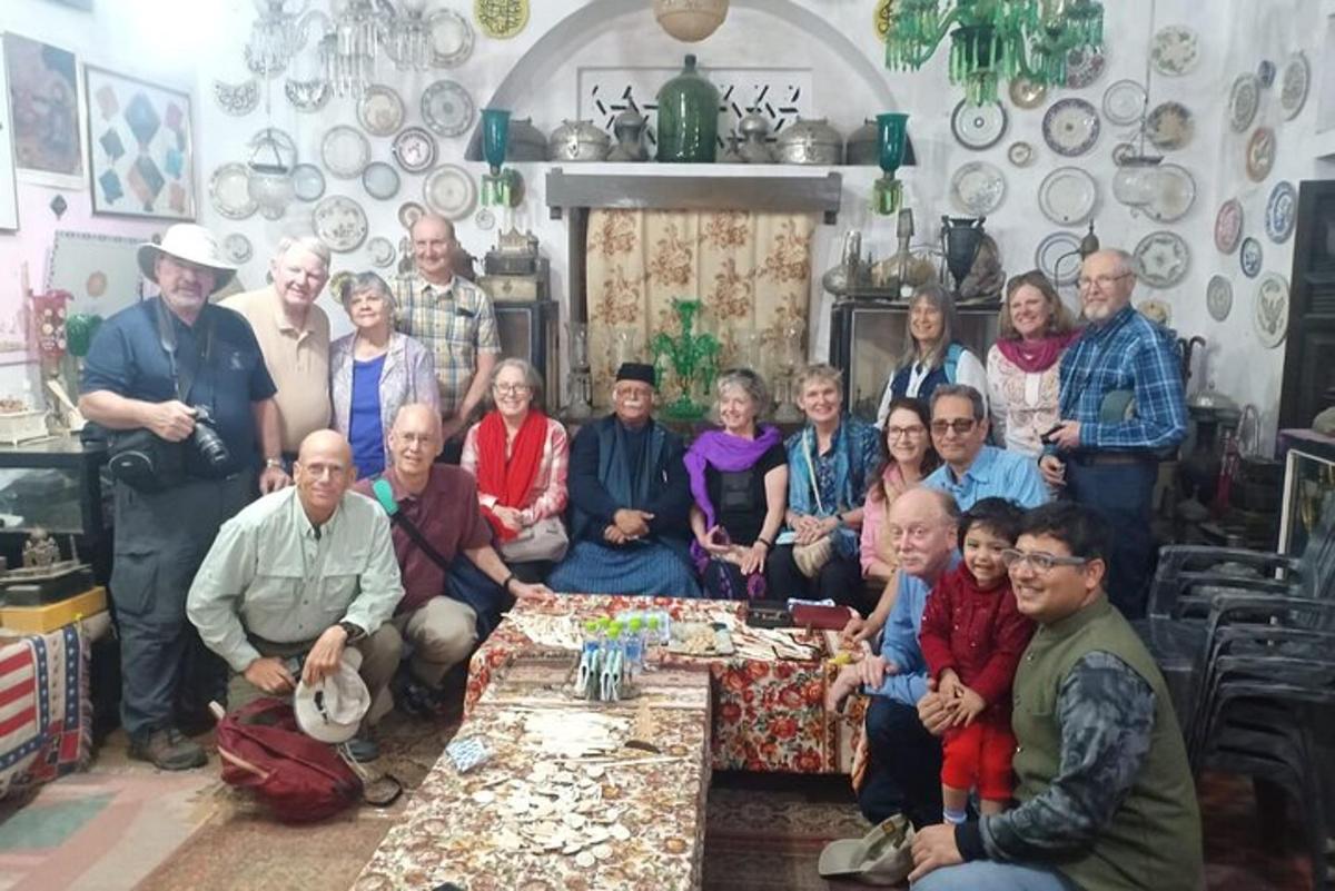 a group of people posing for a picture in a room