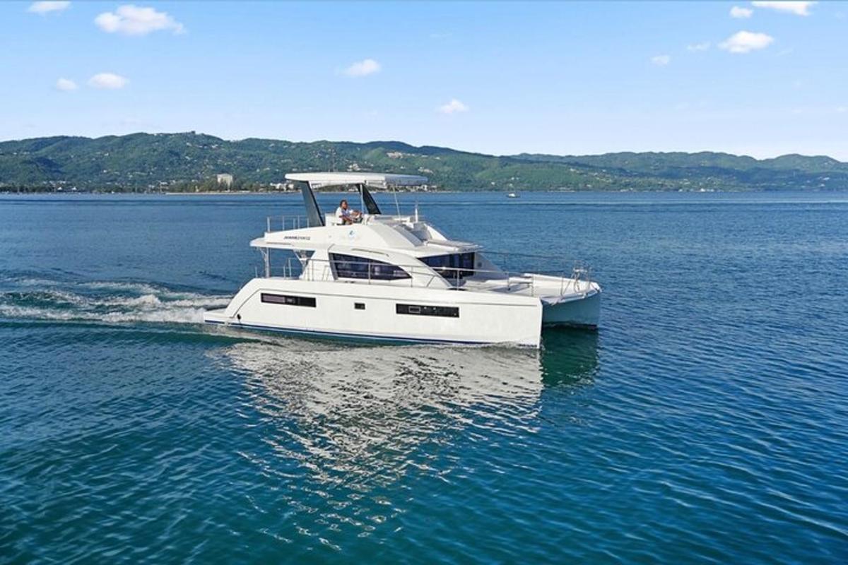 a white boat on a large body of water