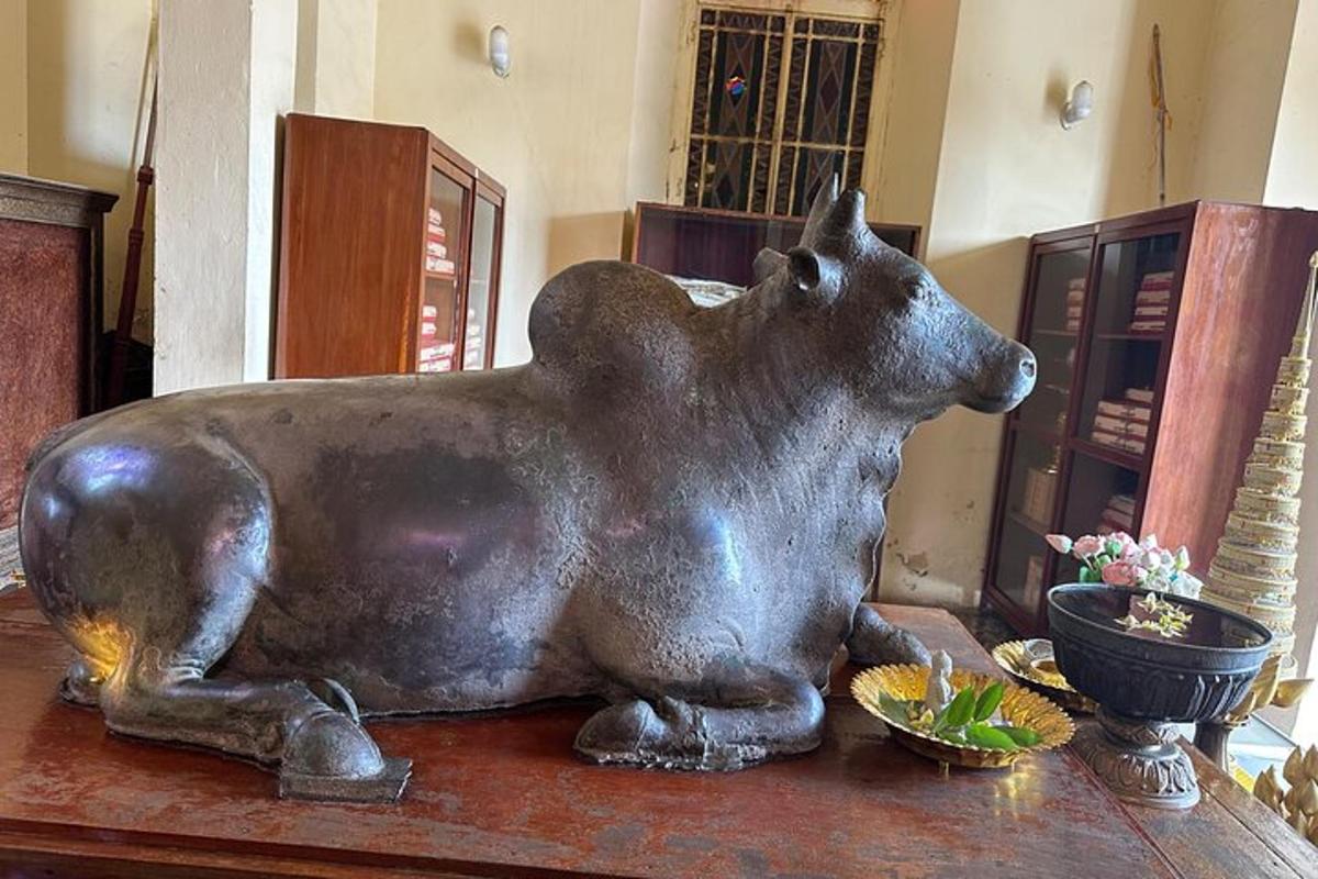 a statue of a bear sitting on a table