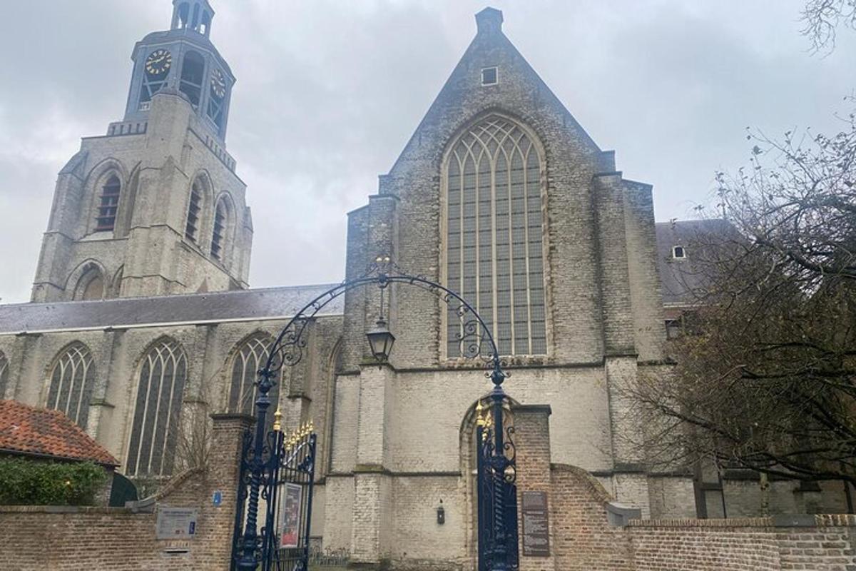 a large church with two towers and a gate